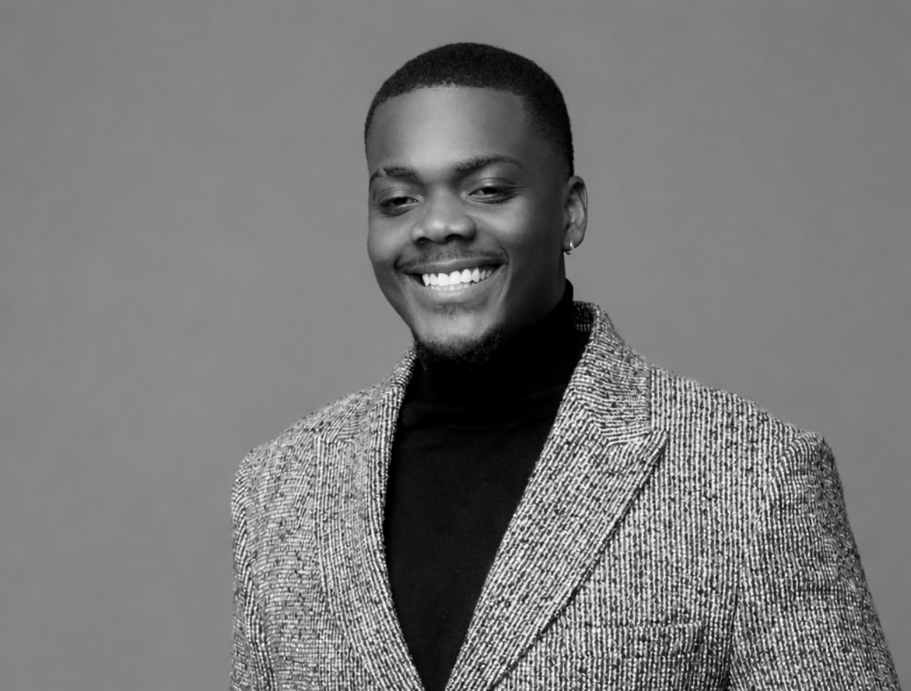 Dino portrait, smiling, black and white editorial
